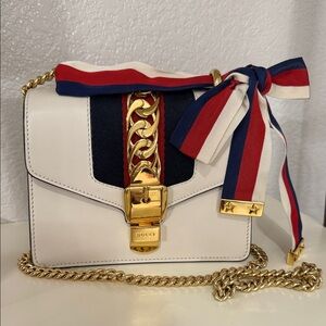 Gucci Sylvie leather mini bag - White Crossbody Bag with Gold and Red Accents
